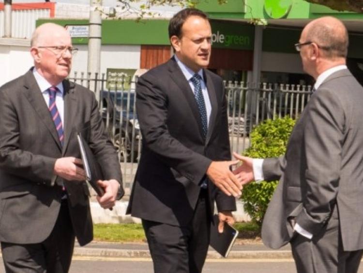 Minister for Foreign Affairs and Trade, Charlie Flanagan and Minister for Health, Leo Veradkar are welcomed at Portlaoise by Frank Dolphin, Chairman Midlands Hospital Group. Photo Denis Byrne.