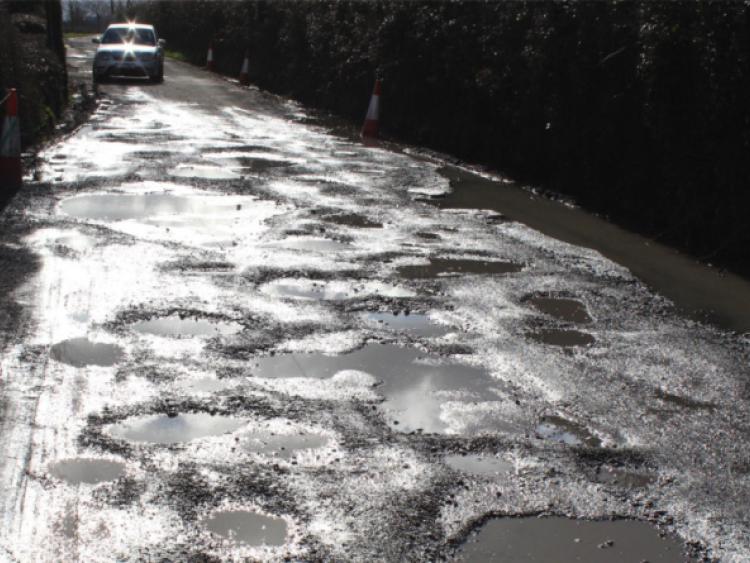 Potholes filling "a waste of money".