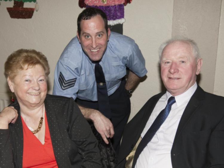 Dan and Patty Lalor with Sgt Michael Carey at the Abbeyleix Senior Citizens party in Abbeyleix Parish Hall.Picture: Alf Harvey/hrphoto.ie
