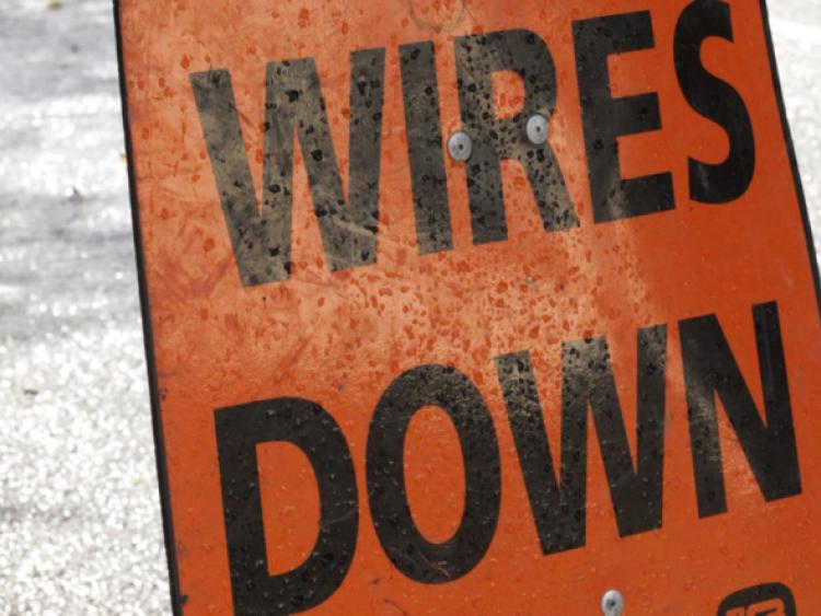 Motorist face delays in glencar on sunday morning as ESB Staff make repairs to a pole which was severely damaged. Photo David Mc Daid.