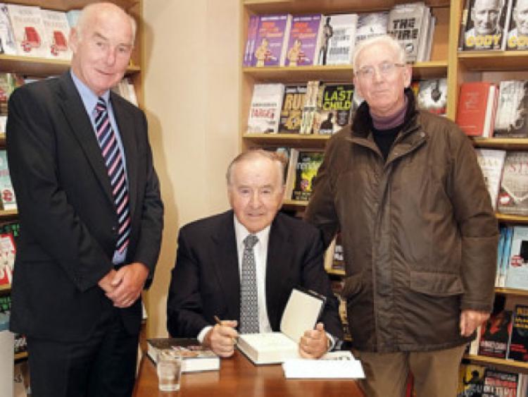 The late former Taoiseach Albert Reynolds signing his autobiography for Cllr  Jerry Lodge and Pat Malone  who were present at the launch at Eason bookstore in Portlaoise in 2009.