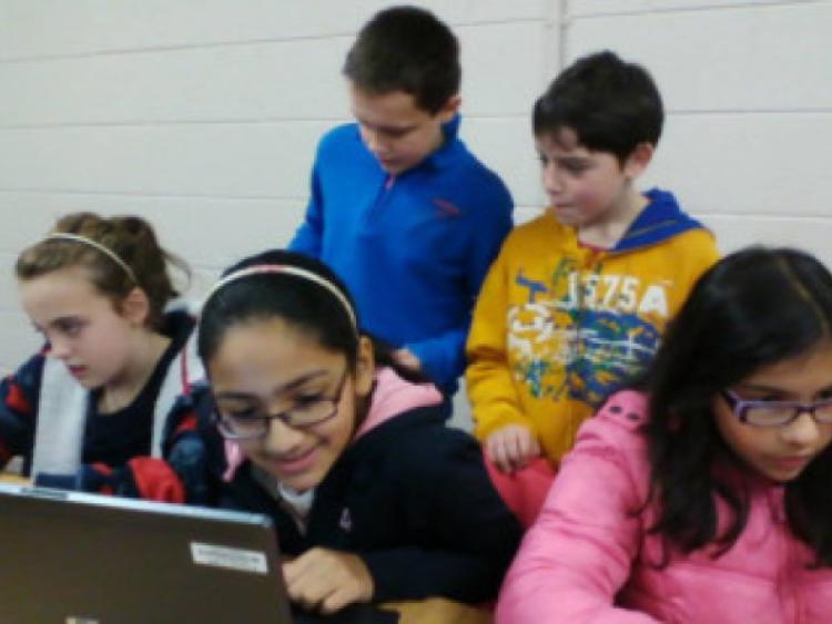 Children learing at the Portarlington Coder Dojo Club.