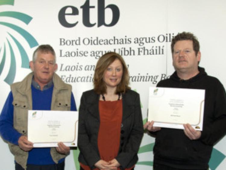 Tony Hartnett and Michael Ryan who received a FETAC Major Award with Kathleen Dunne Adult Literacy Organiser, Portlaoise Adult Education Centre.