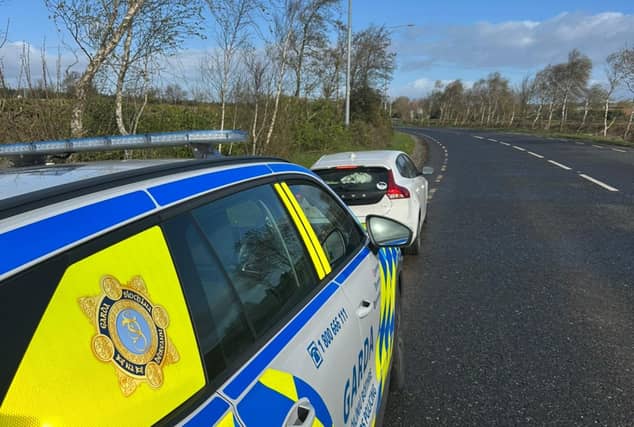 The white Volvo hatchback stopped by a Laois Garda roads policing unit.