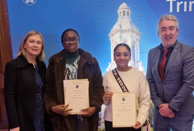 Pictured: students Oluchi Onyinyechi Izima and Abigail Osula with Portlaoise Institute's Keith McClearn and Patricia Creery..