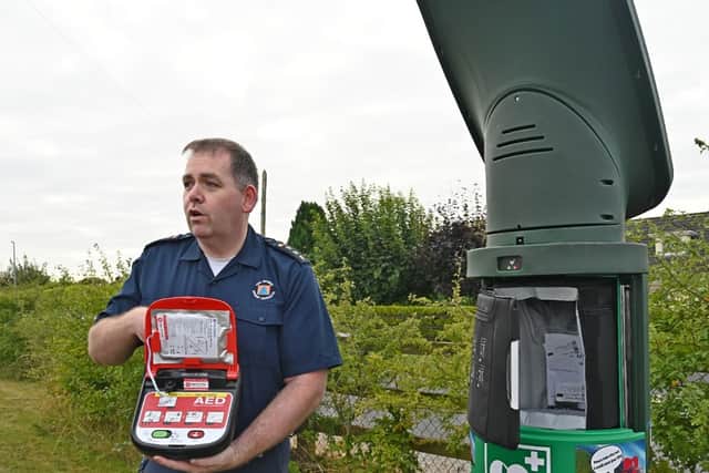 Former Laois mayor installs AED device where wife sadly passed away