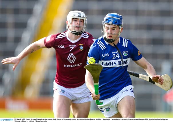 Tomás Keyes of Laois in action against Jack Galvin of Westmeath during a Allianz Hurling League game. Pic: Sportsfile