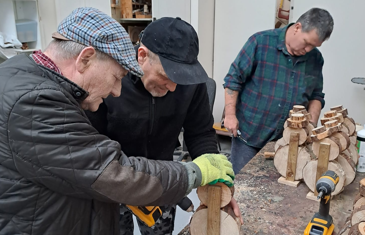 A festive woodwork workshop underway for the December market in Portlaoise Macra Hall.