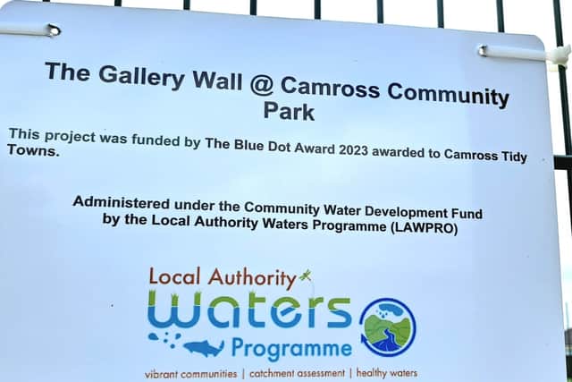 A 'gallery wall' can be found on the looped walkway, adjacent to the local national school. It displays information related to local biodiversity. 