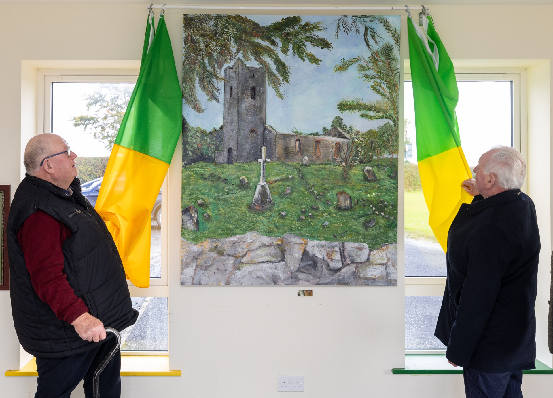 Har Ramsbottom and Arthur Drennan  unveil paiting of Dysart Enos old Church by artist Aileen Donovan at Park Ratheniska GAA Club Creative Laois/Creative Ireland under the Heritage through Art Scheme.