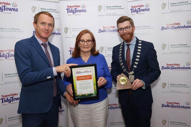 Caroline Whitelegg, Portarlington Tidytowns accepted the Endeavour award in the 2022 Supervalu Tidytowns competition.