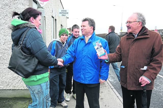 Laoid TD Sean Fleming on the canvas with his brother Padraig.