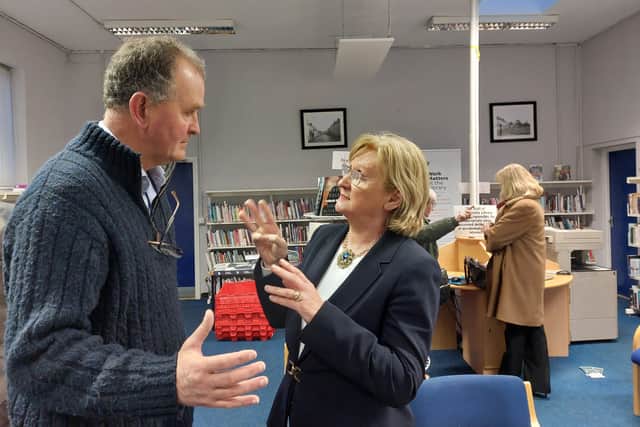 Below: Eibhlin Byrne meeting Rathdowney residents at an information day on the Ukraine housing estate going into the town.