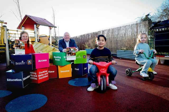 Pictured are (L-R) Suzanne Connolly, Barnardos CEO, Niall O’Connor, ALDI Ireland Group Managing Director, RJ and Ella