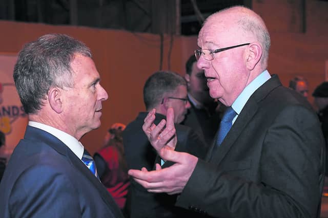 Sean Fleming of Fianna Fáil in conversation with Charlie Flanagan of Fine Gael at the Laois Offaly General Election 2020 count in Portlaoise. Picture: Alf Harvey.