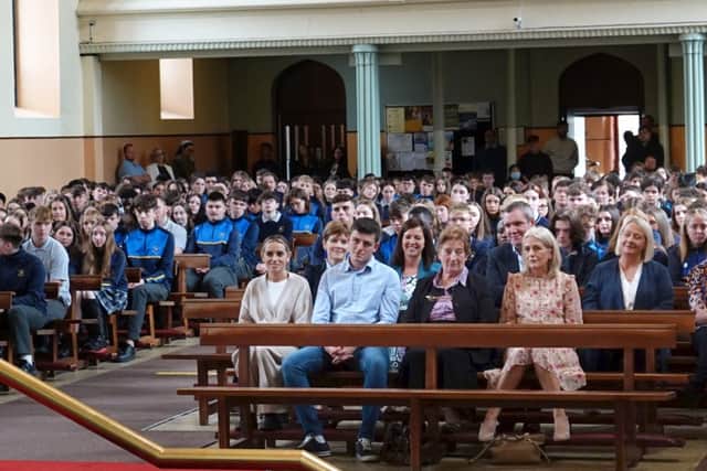 Seamus Bennett addressing Colaiste Iosagain students and staff at the school mass. Photo: Michael Scully.