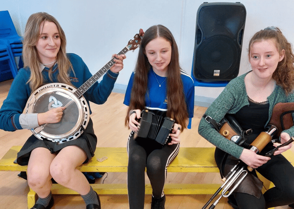 Moya, Edel and Niamh demonstrating some pf the instruments at Portlaoise Comhaltas open evening recently