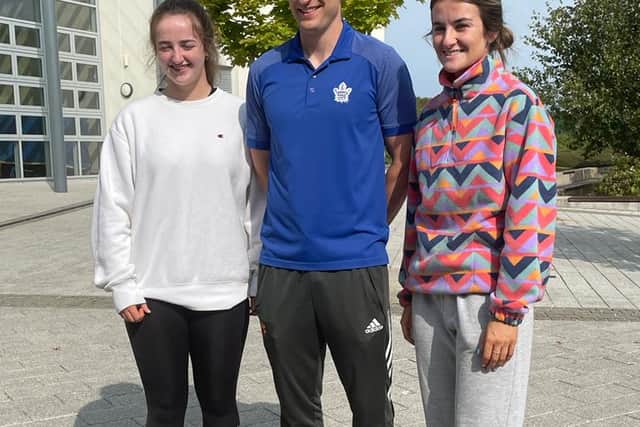 Below: John Scully PE teacher with H1 in LCPE students Ella Byrne and Eleanor Healy. 