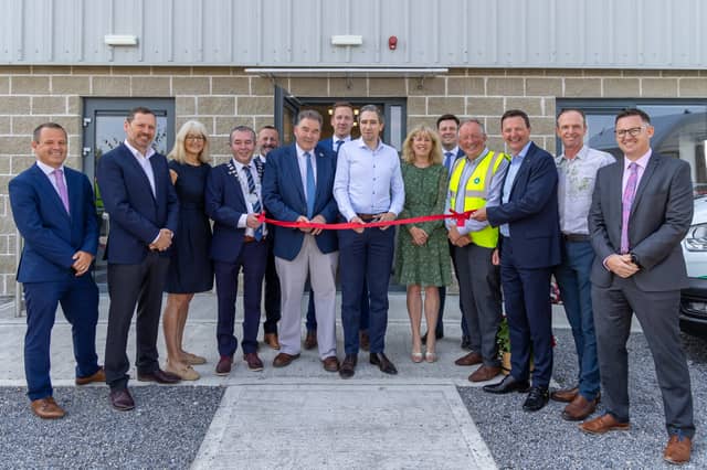 Minister Simon Harris cuts the ribbon. Pic Paul Moore