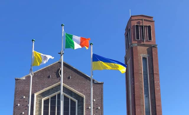 Flags flying at Portlaoise parish church. Pic: Portlaoise Parish