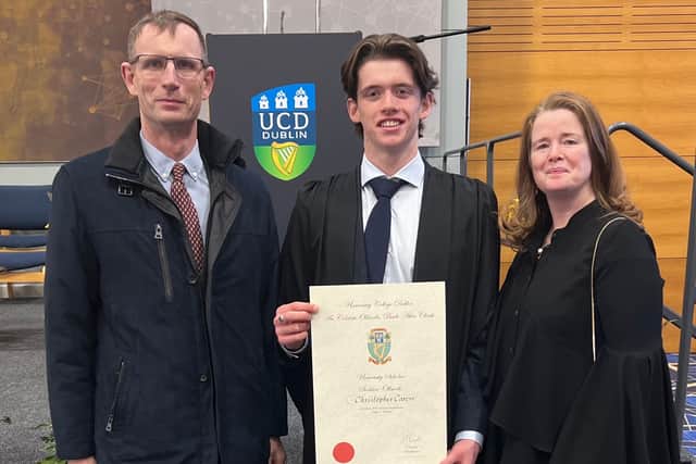 Pictured below with parents Tim and Martina.