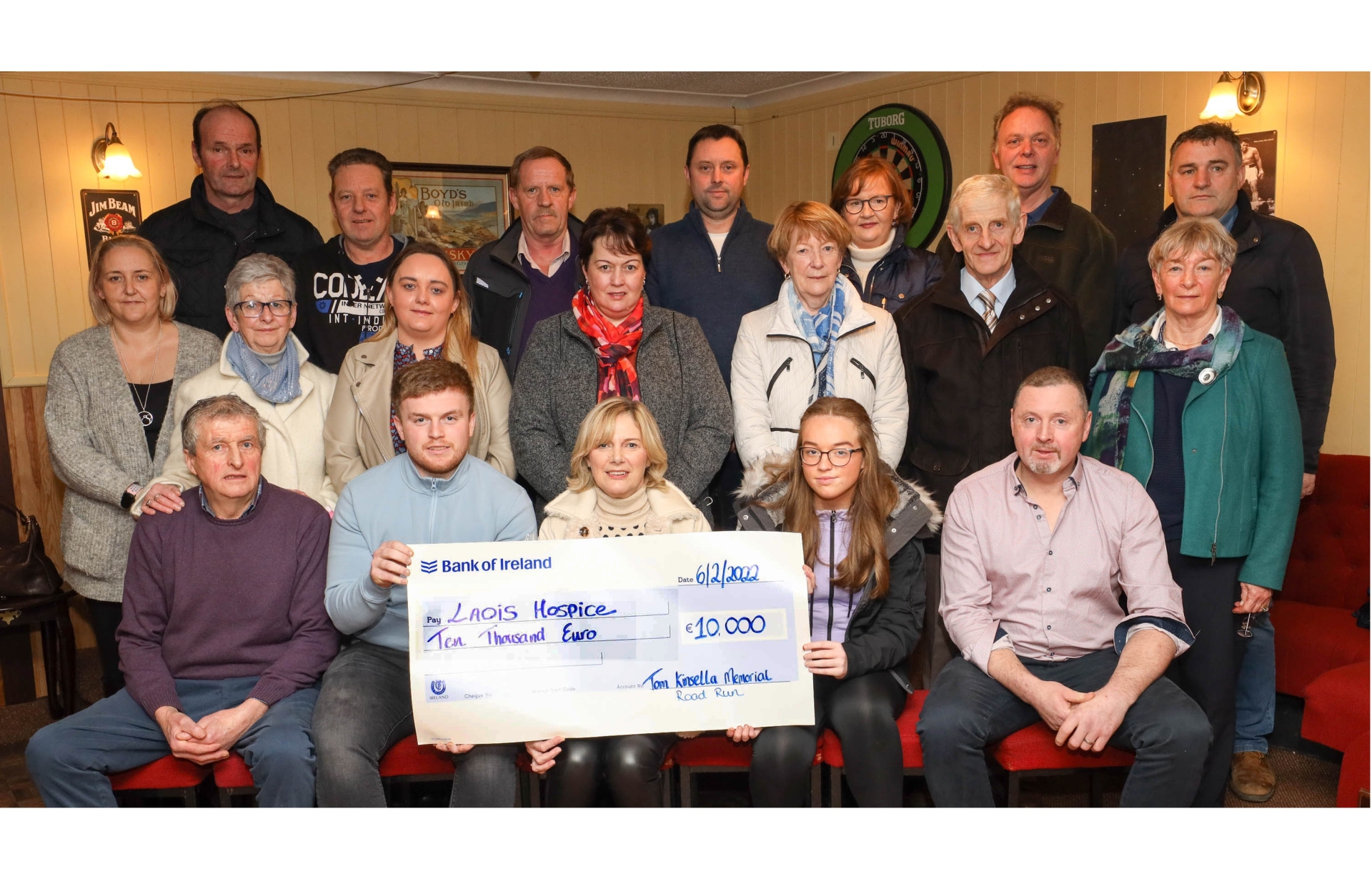 Presenting the cheque to Laois Hospice are members of the Kinsella family, of Ballyroan Vintage and of Knock Vintage Mens Shed. Photo: Alf Harvey