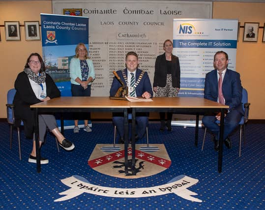 Laois County Council Cathaoirleach Conor Bergin inks deal at County Hall in Portlaoise