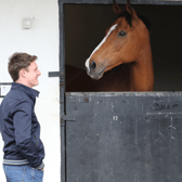 Paul Townend and Patrick Mullins with the recently retired Faugheen at the Irish National Stud.