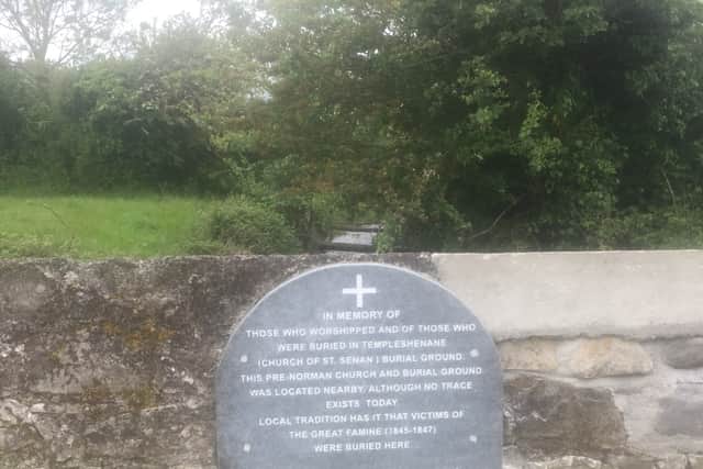 The site is known as Templeshenane and the memorial stone has been erected on a bridge over the river Ennie, close to Kilcooney bog. More below picture. 