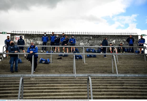 Laois players and officials await permission to enter the dressing rooms before the Allianz Football League Division 2 South Round 1 match between Clare and Laois at Cusack Park in Ennis.