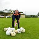 Paul Gallagher, team official, sanitising the footballs before a Glenswilly GAA Club training session last summer  Picture: Oliver McVeigh/Sportsfile