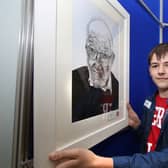 Ciarán Leonard (13), from St Mary's CBS, Portlaoise, with his artwork ‘Weathered Wisdom’.