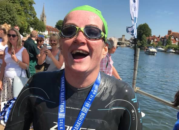 A happy Joan Fennelly after completing the 14km Thames Marathon