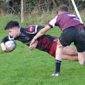 Reece Cuddihy stretches to score Port’s seventh try last Saturday.