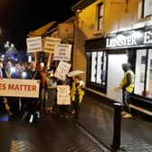 Fr Paddy Byrne addresses the public protest in Portlaoise.