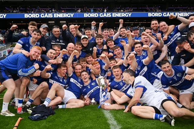 The Laois team celebrate with the Joe McDonagh Cup after the Joe McDonagh Cup final. Photo by Ramsey Cardy/Sportsfile