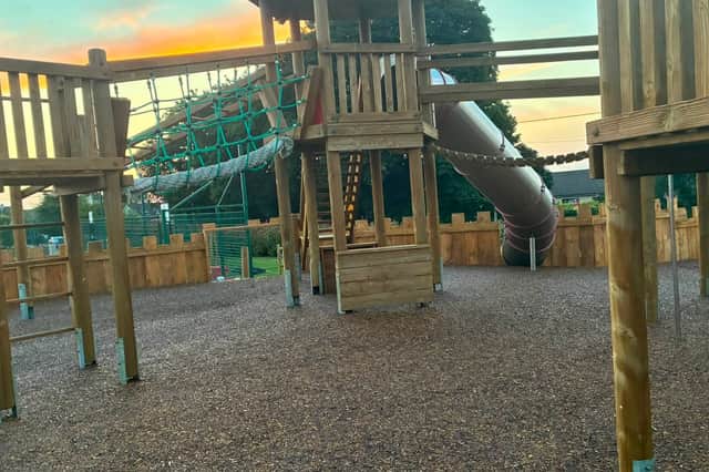 The park saw wood chippings replaced with soft, rubber flooring surrounding the central climbing frame, with the replacement of all wooden structures