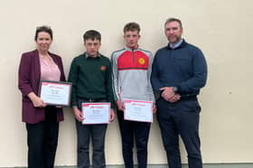 Carole Divine, Principal of St Fergal's College, with students Emmanuel Collins Begado and MJ Muldowney, who received the CPR 4 Schools Heroes Award, pictured with former Deputy Principal, PJ Delaney.