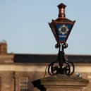 The Garda logo on a lamp at the entrance to Garda Headquarters in the Phoenix Park, Dublin