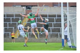 Paddy Purcell flicks in his second and Rathdowney-Errill’s third goal against Portlaoise on Sunday 