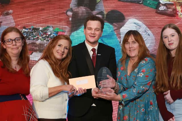 John Oxley, Chairman Laois PPN,   presents the Social Inclusion   Category  Award to All Abilities members - Frances Kavanagh, Kelly Hyland, Shauna O'Neill and Nicola Coss .