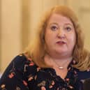 Naomi Long at a press conference in Belfast