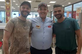 The 2026 Irish Traitors winner Diego Caixeta with husband and fellow contestant Denis in Portlaoise Plaza with staff member Jason 