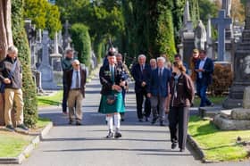 Piper leads Colonel Fitzmaurice Committee towards the Grave of Col. Fitzmaurice Glasnevin Cemetery
