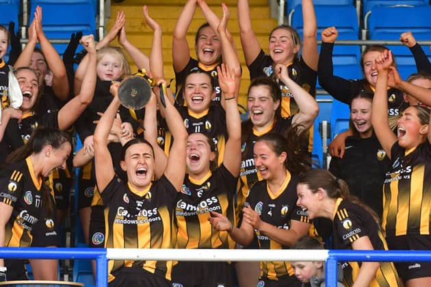 Camross Captain Aoife Collier raises the Intermediate Camogie Cup in 2025 