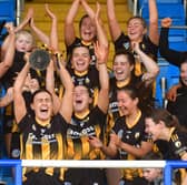 Camross Captain Aoife Collier raises the Intermediate Camogie Cup in 2025 