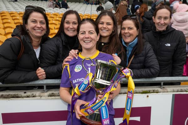 Laura Dunne with family after St Brigid's were crowned Leinster champions in 2024