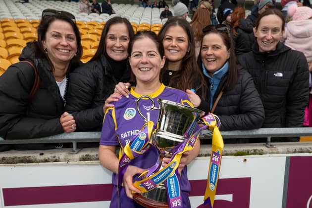 Laura Dunne with family after St Brigid's were crowned Leinster champions in 2024