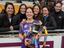 Laura Dunne with family after St Brigid's were crowned Leinster champions in 2024