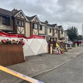 Floral tributes outside the house in Waterford